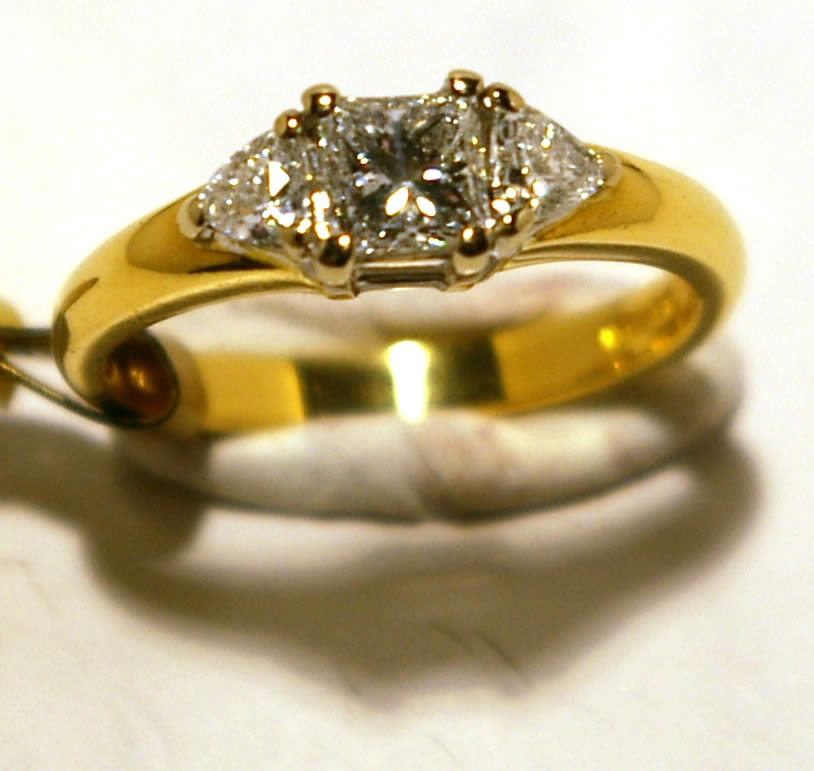18ct Yellow and White Gold Princess Cut and 2 Trilliant Cuts Diamond 3 Stone